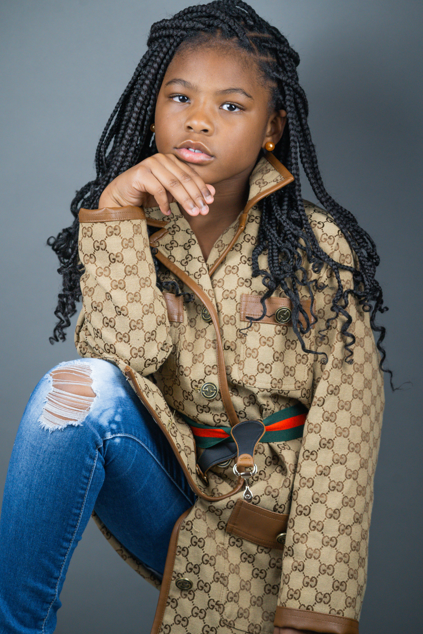Child portrait in fashion jacket with attitude