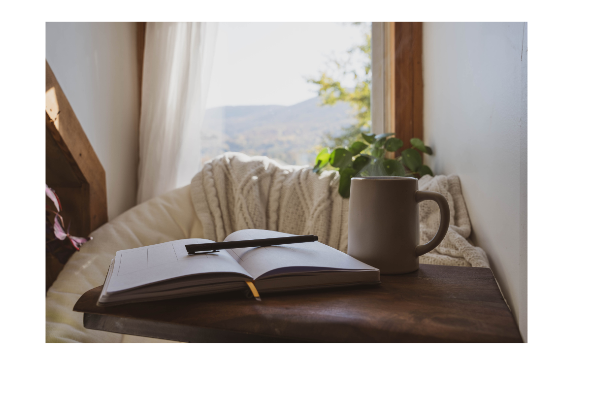 Open journal by a window with soft natural light